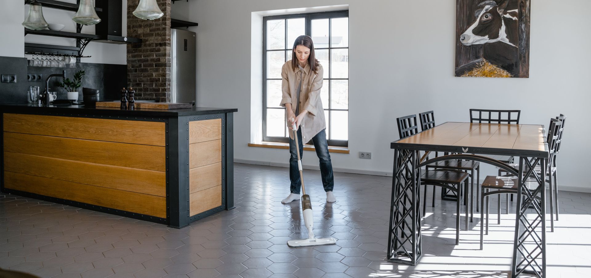 A Woman Mopping the Floor